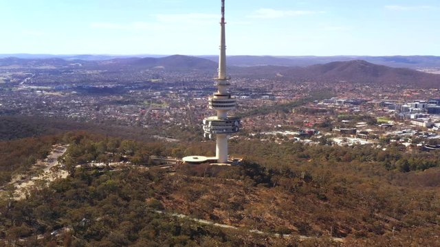 Aerial view of Telstra Tower in Canberra, the capital of Australia showing a beautiful panoramic view of the city and surrounding countryside       