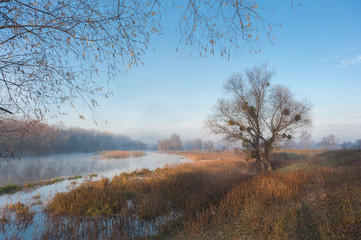 Obraz na płótnie Canvas Beautiful autumn landscape with river