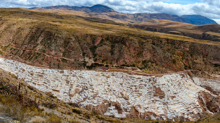 Panoramic view of Salt terraces of Maras ( Salineras de Maras)  in the region of Cusco, Peru.