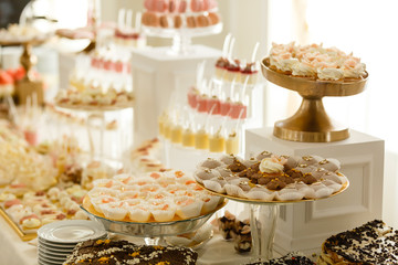 Delicious sweet buffet with cupcakes. Sweet holiday buffet with cupcakes and other desserts. Candy Bar.
