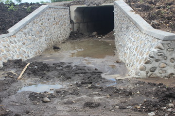 irrigation structure of rice fields beside the road