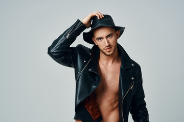 portrait of young woman in black hat