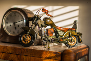 Fototapeta na wymiar Little toy motorbike