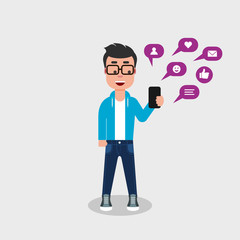 Young man in jeans and sweatshirt is looking at his smart phone notifications with a smile. Boy using his phone,texting. Mobile phone, social media, addiction, concept. Man looking at his cell phone. 