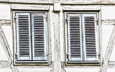 Close up of blue wooden shutters on an old timbered house