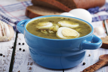 A bowl with homemade sorrel soup	