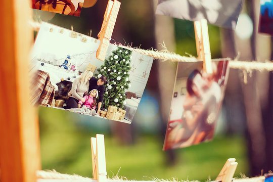 Multiple Infant Images Hanging Outdoors on a Clothesline