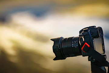 Camera taking picture film on nature