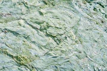 Green rough stone background