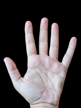 Male left hand palm with black background