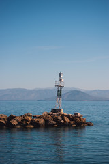 Vocation in Greece, Corfu. Water, cliff, mountains, and beautiful summer evening 
