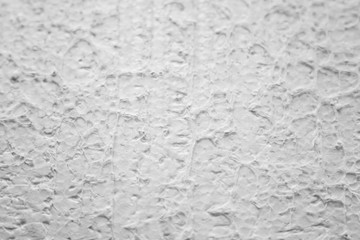 The texture of expanded polystyrene closeup. Sound and thermal insulation for construction, production of containers and lodges.