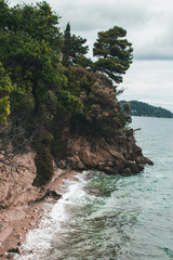 Vocation in Greece, Corfu. Water, cliff, mountains, and beautiful summer evening 