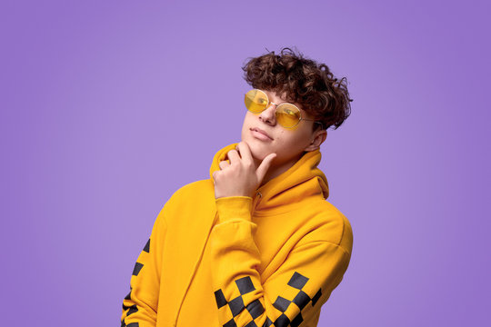 Thoughtful teenager looking away