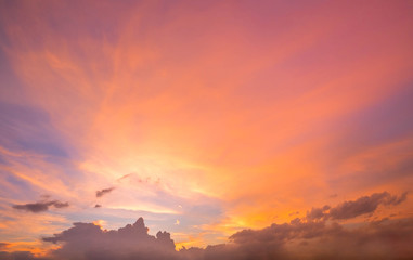 Dramatic golden sunset and sunrise over mountain morning twilight evening sky.