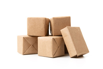 Online shopping and delivery concept. Bunch of express delivery carton boxes. Mini cardboard boxes. Parcel boxes with craft paper.