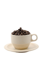 Coffee beans in a porcelain cup isolated on white background
