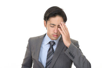 体調不良の男性