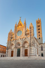 Cathedral in Siena Italy Tuscany, with White and Blue And Gray Striped Marble Round Window, Bell Tower, and Dome