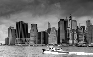 View of Manhattan and a police boat