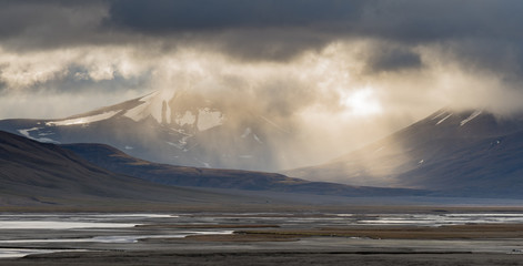 Sun breaks through in Adventdalen Svalbard