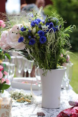 Festive bouquet with blue and pink flowers. Flowers for the wedding