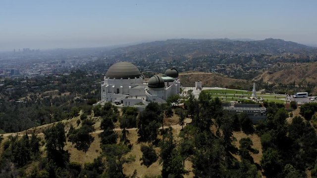 Aerial video slowly orbiting the Griffith Observatory