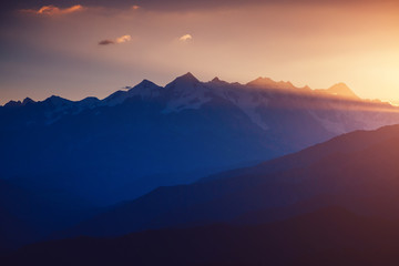 A look at the grand ridge at twilight. Location Upper Svaneti, Georgia country, Europe. Main Caucasian ridge.