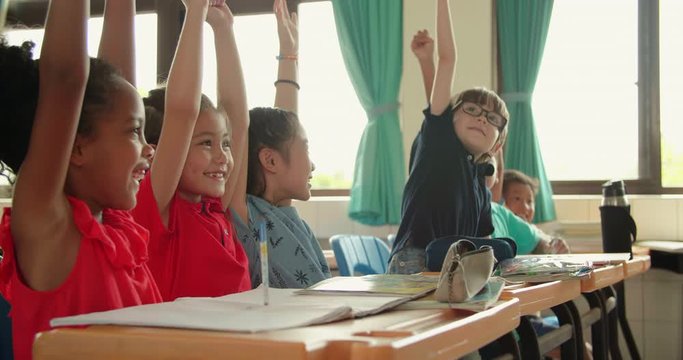 happy elementary school kids  in classroom