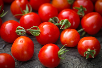  Cherry tomatoes on a wooden table