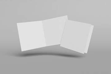 Two Mockup square booklet, brochure, invitation isolated on a grey background with hard cover and realistic shadow. 3D rendering.