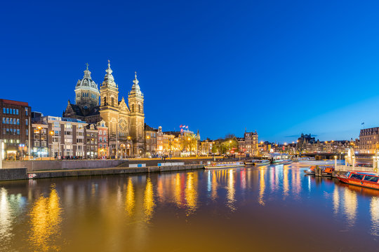 Amsterdam skyline with landmark buidings and canal in Amsterdam city, Netherlands
