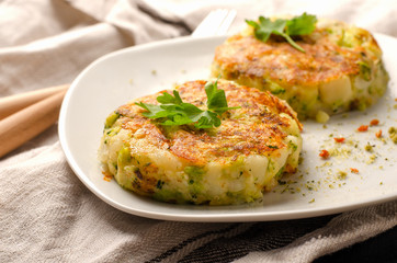 Healthy vegetable vegetarian cutlets from carrot, broccoli, potato with herbs