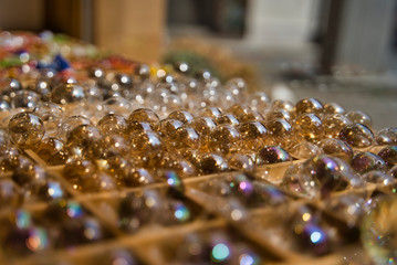 Many white transparent glass sphere with glares