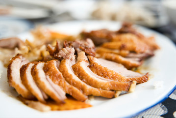 Delicious juicy roast pork meat cut in slices