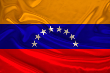 photo of the national flag of Venezuela on a luxurious texture of satin, silk with waves, folds and highlights, close-up, copy space, illustration