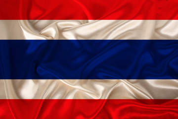 photo of Thailand national flag on a luxurious texture of satin, silk with waves, folds and highlights, closeup, copy space, travel concept, economy and state policy, illustration