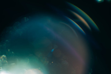 Blur multicolor lens flare glow. Teal blue abstract art background. Galaxy design.
