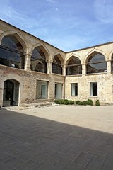 Fototapeta na wymiar View of the courtyard of famous historical Deveci Han building in Edirne, Turkey.