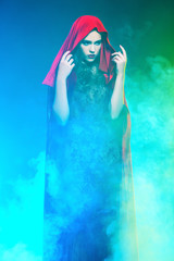 mysterious stranger in cloak