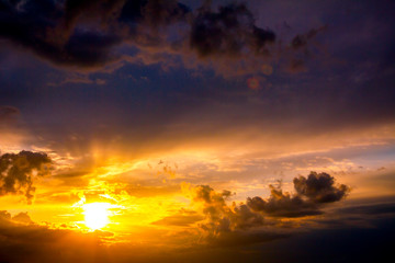 Fototapeta na wymiar Dark sky with clouds at sunset