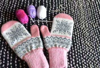 Handwork. Knitting warm winter clothes at home.