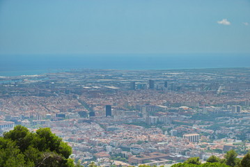 Amazing beautiful view from Mount Tibidabo to Barcelona and the Sea