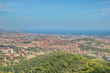 Amazing beautiful view from Mount Tibidabo to Barcelona and the Sea