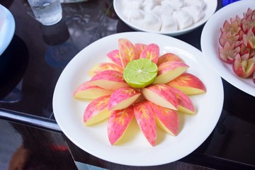 Engraving apples and limes. The fruit is delicious.