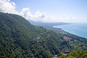 Summer landscape in the mountains and dark blue sky with clouds