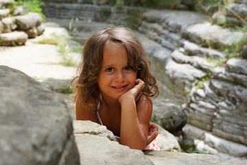 Beautiful 4 year old girl in the beautiful scenery of Papingo Rock Pools