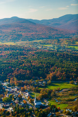 Fototapeta na wymiar Aerial view of the town of Stowe Vermont on a colorful autumn afternoon