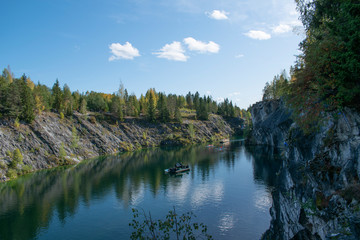 Fototapeta na wymiar quarry lake in the forest