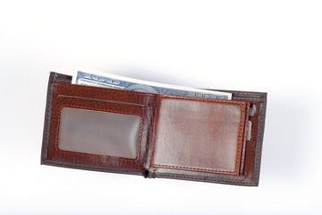 Brown leather pocket money ,financial concept.